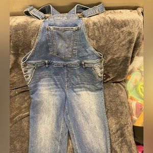 multiple larger sized Jean overalls. Both blue Jean and black. Brand new tags on